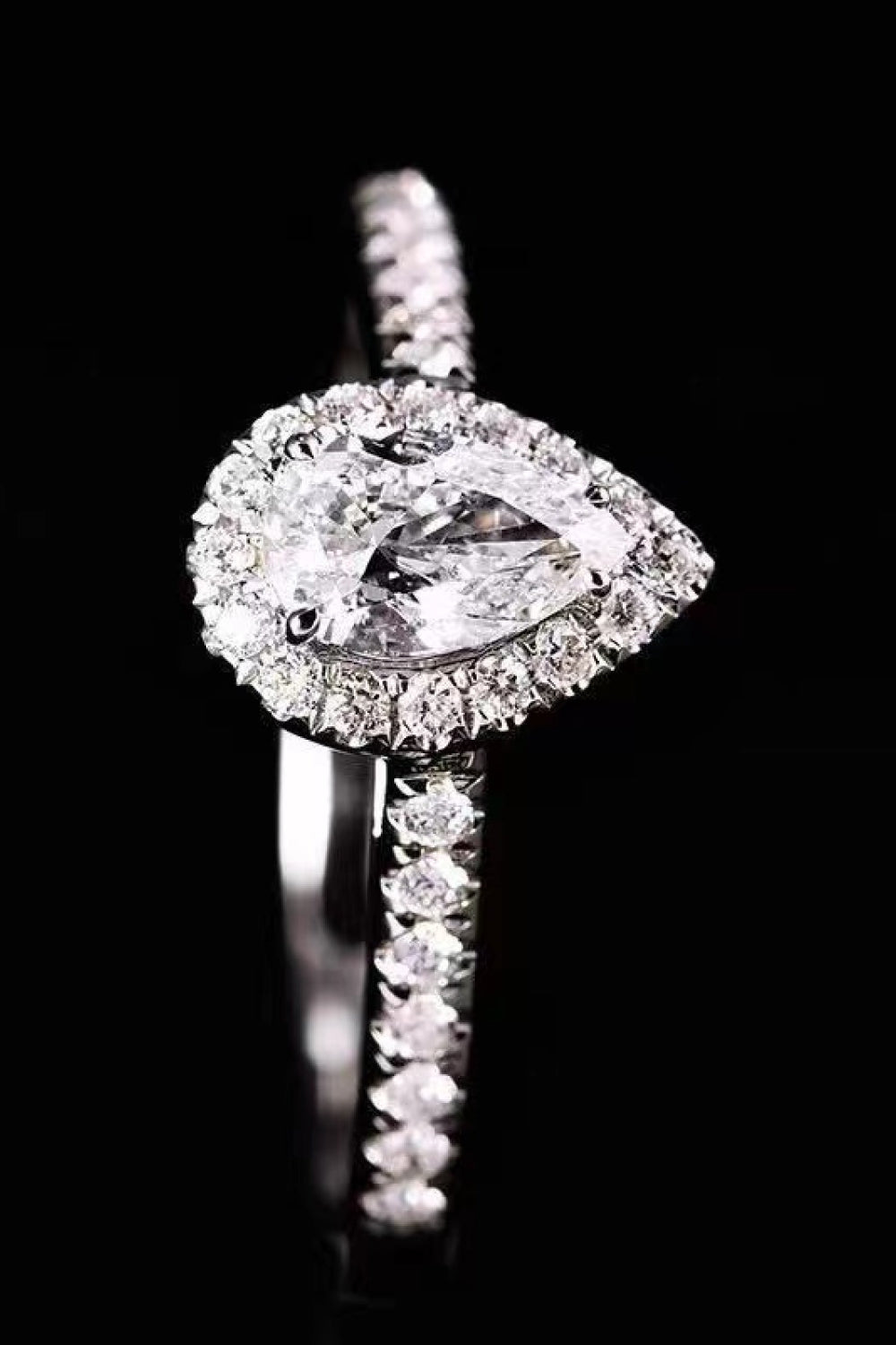 2 Carat Moissanite Pear shaped Halo Ring