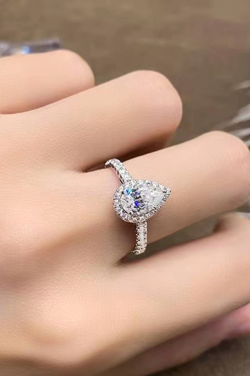 2 Carat Moissanite Pear shaped Halo Ring