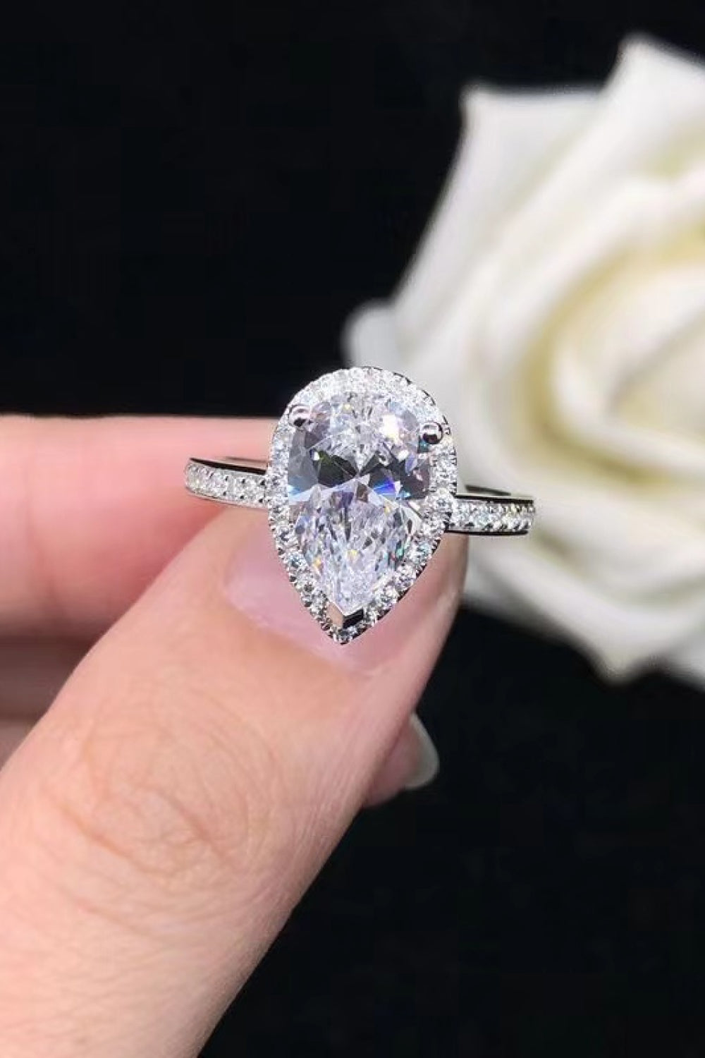 2 Carat Moissanite Pear shaped Halo Ring