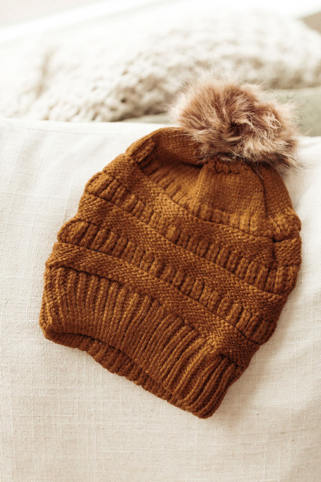 Faux Fur Pom Pom Beanie In Brown