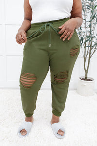 Kick Back Distressed Joggers In Olive