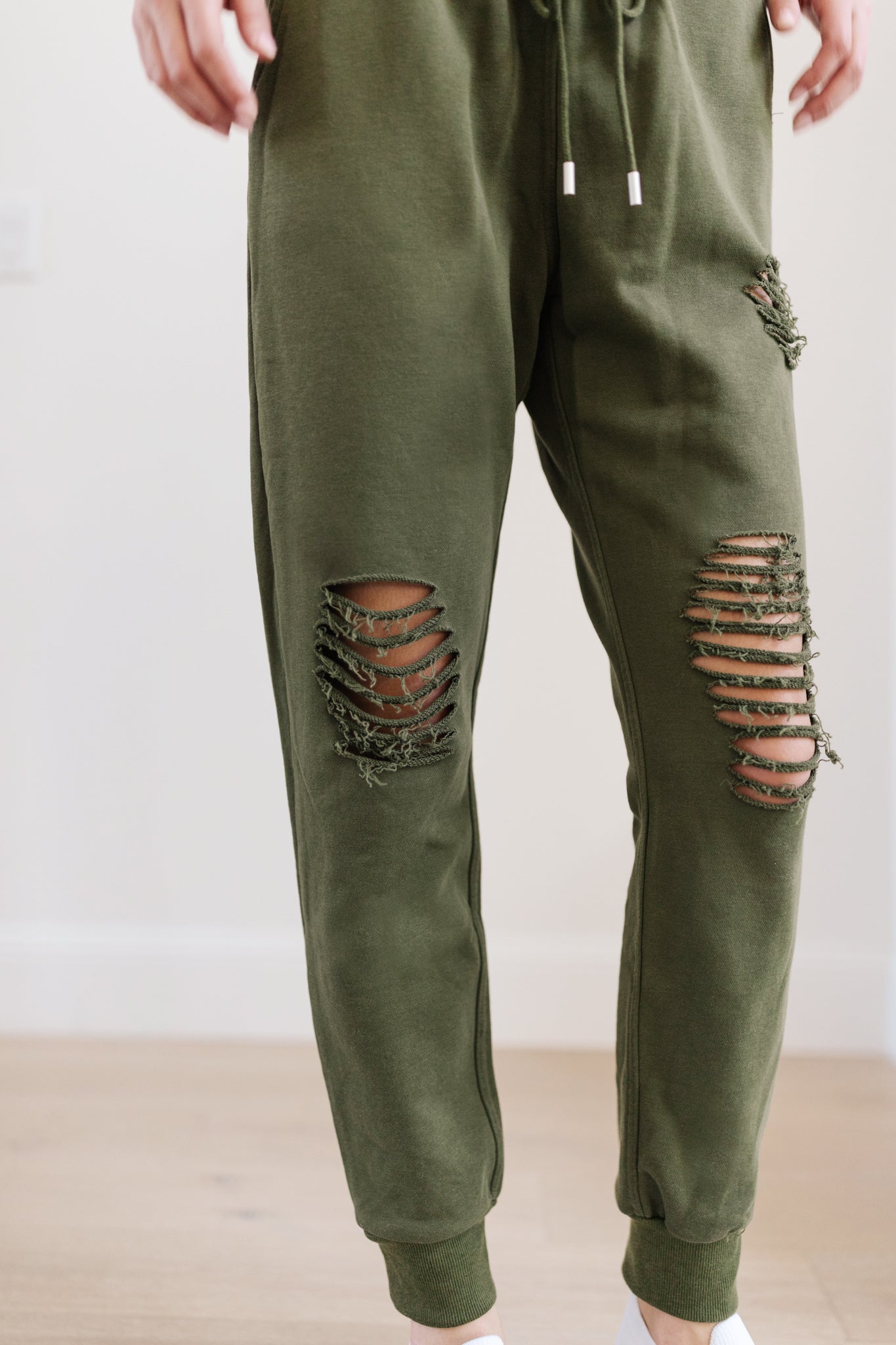 Kick Back Distressed Joggers In Olive