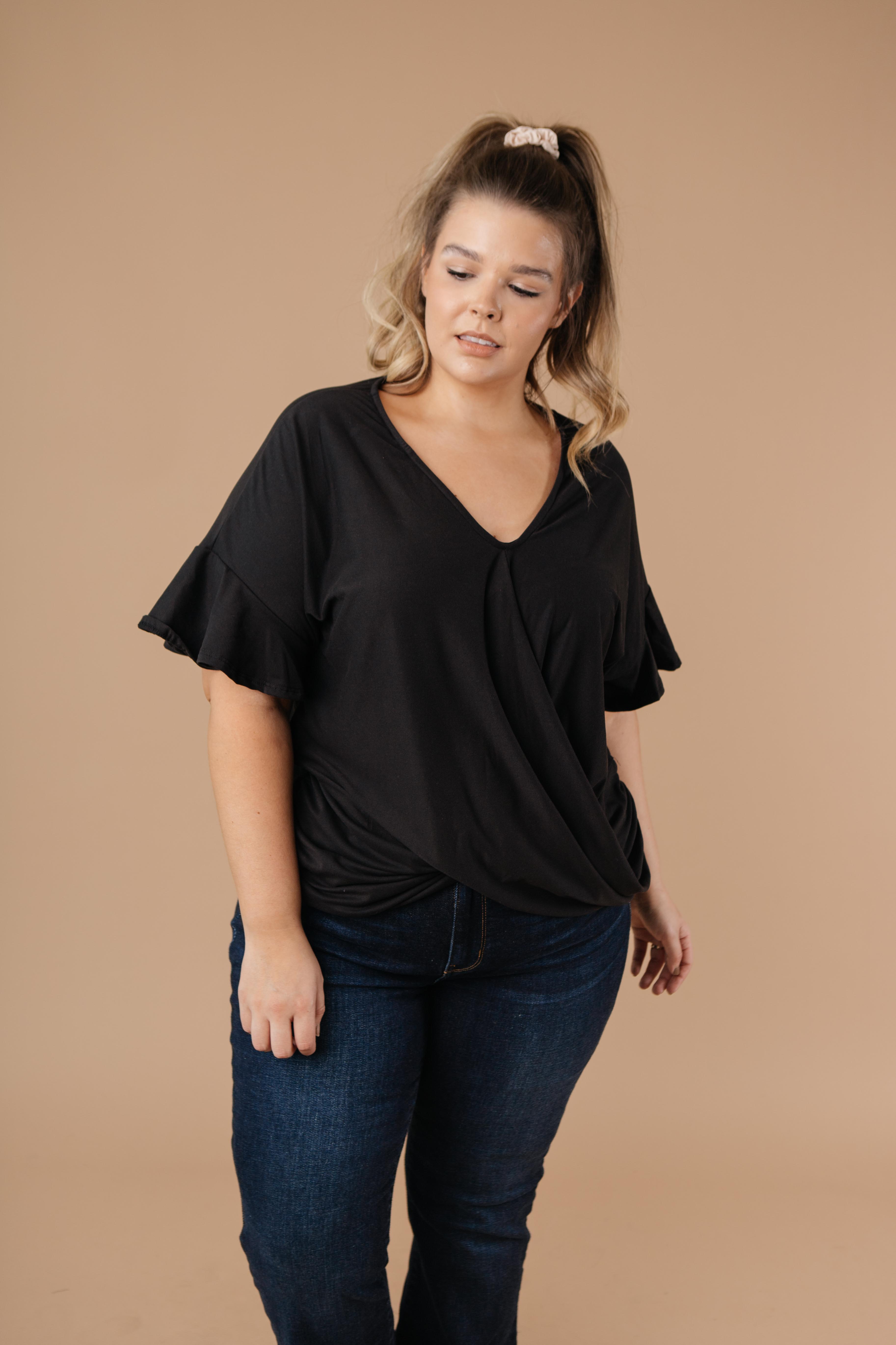 Nice Surprise Surplice Knit Top In Black