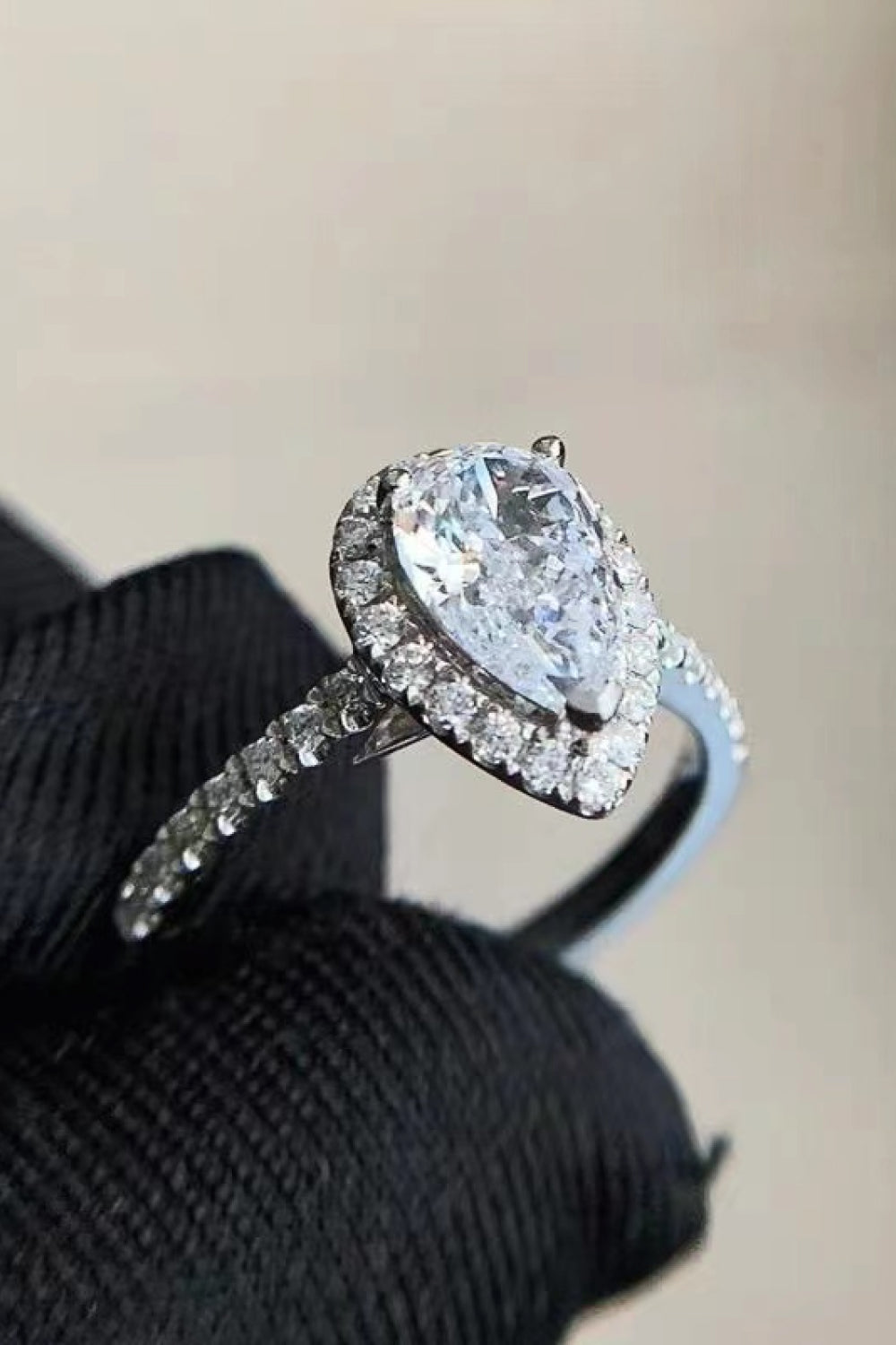 2 Carat Moissanite Pear shaped Halo Ring