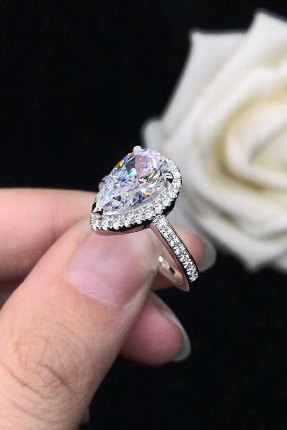 2 Carat Moissanite Pear shaped Halo Ring